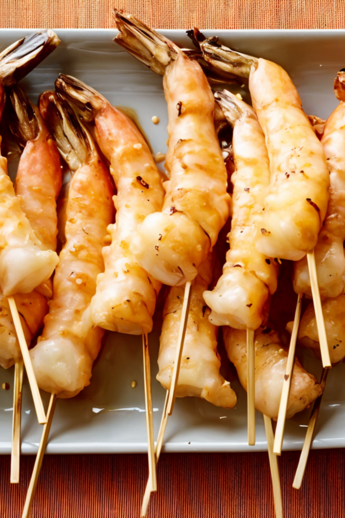 Grilled Shrimp Skewers with Soy Sauce, Fresh Ginger and Toasted Sesame Seeds